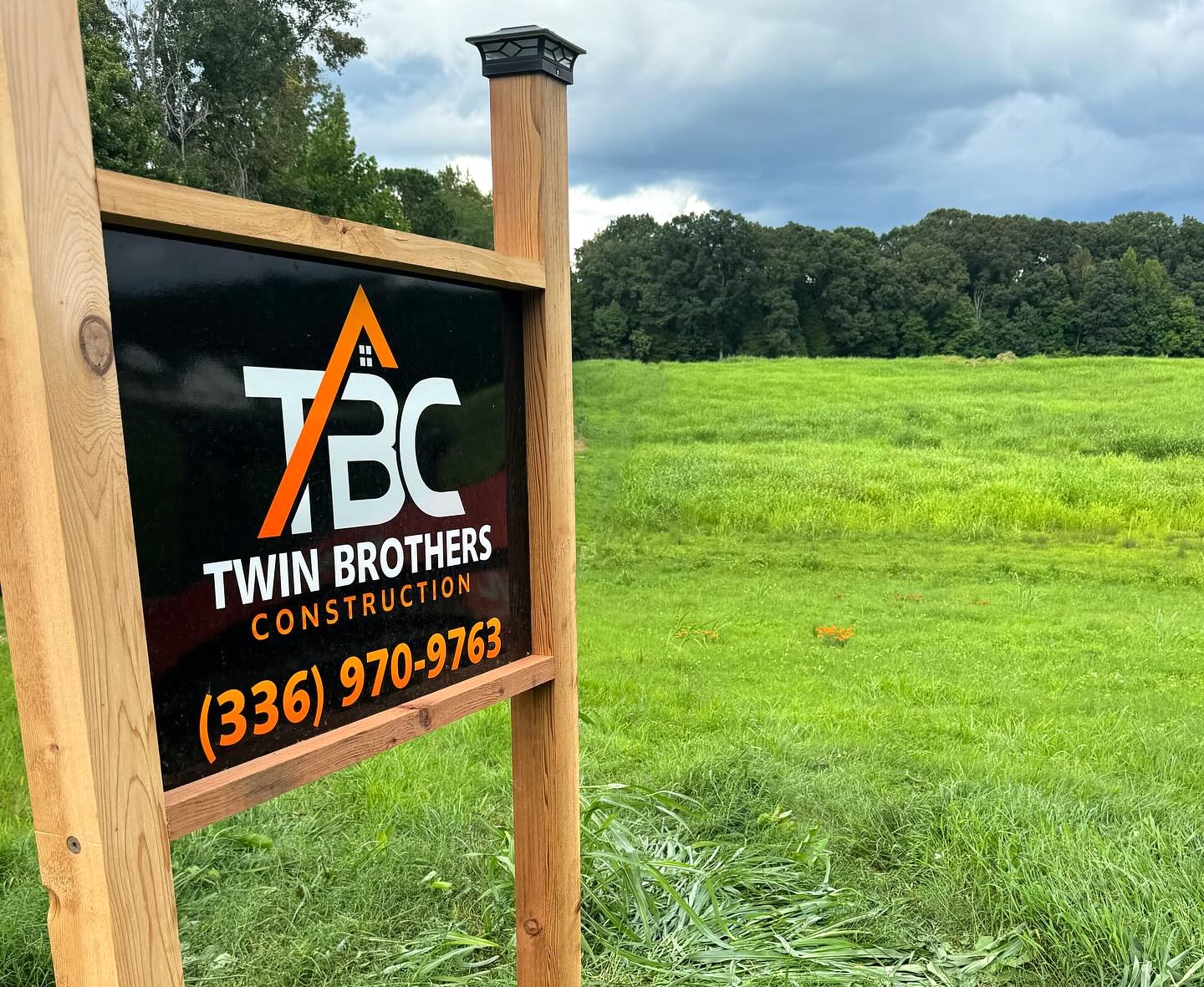 Twin Brothers Construction Sign